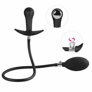 Expandable butt plug with ball