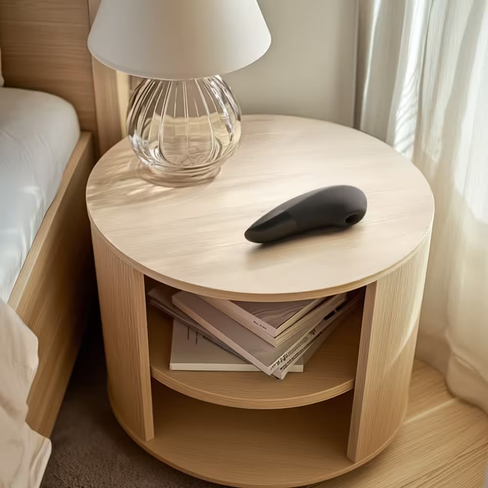 Lolita-erotic-shop-Womanizer-Enhance-black-9 Enhance on a nightstand